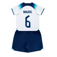 Koszulka piłkarska Anglia Harry Maguire #6 Strój Domowy dla dzieci MŚ 2022 tanio Krótki Rękaw (+ Krótkie spodenki)